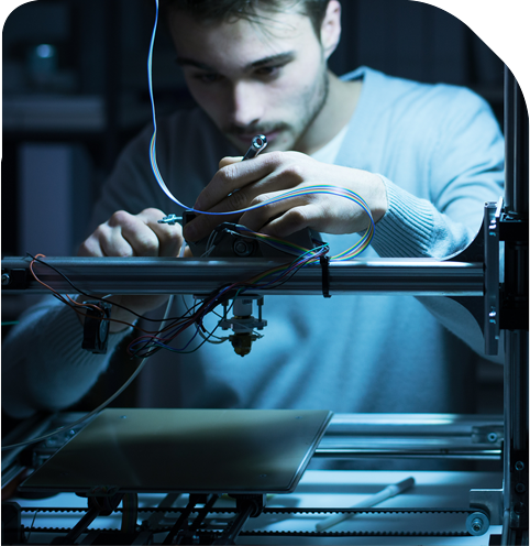 man using 3d printer